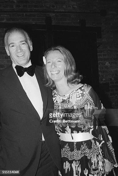 The smiles of Gail Sheehy and Clay Felker add sparkle to a disco party. She's written an article about the publishing struggle between Rupert Murdoch...
