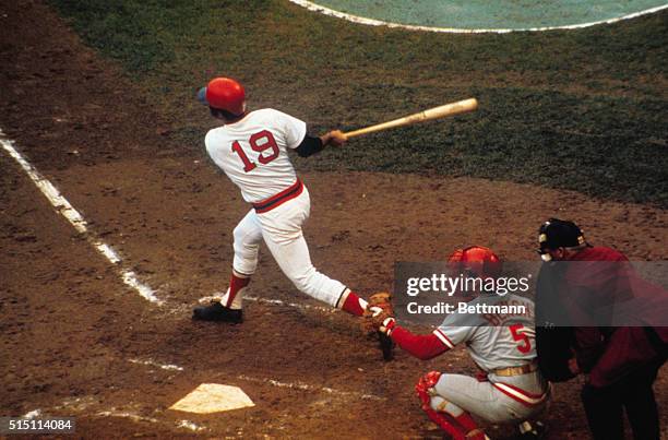 Boston Red Sox Fred Lynn is shown batting in World Series with Cincinnati Reds' Johnny Bench catching.