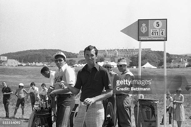 British Open: Hubert Green, of U.S.A., the U.S. Open Champion for 1977 looks pleased just after his hole-in-one on the 167-yard, Woe-be-Tide, hole...