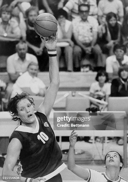 Montreal: Russia's Iuliyaka Semenova almost makes the basketball look like a handball as she gets ready to throw a pass during the women's Olympic...