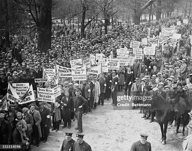 Five hundred unemployed "Hunger Marchers" protest on Boston Common on their way to the State House. Marchers urged unemployment insurance and other...