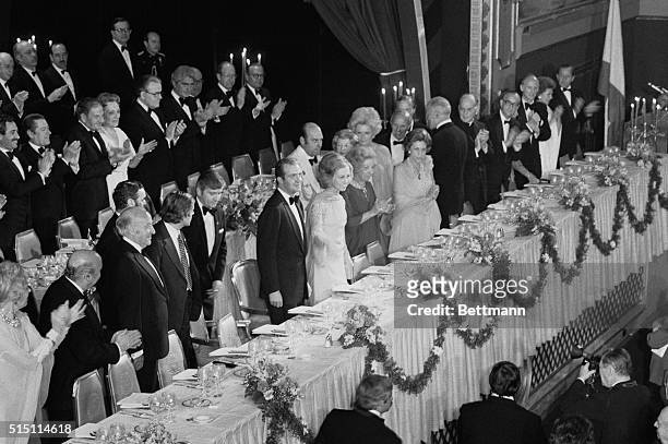 New York: King Juan Carlos and Queen Sofia of Spain, , are applauded at start of banquet in their honor at New York's Waldorf Astoria 6/4. Second...