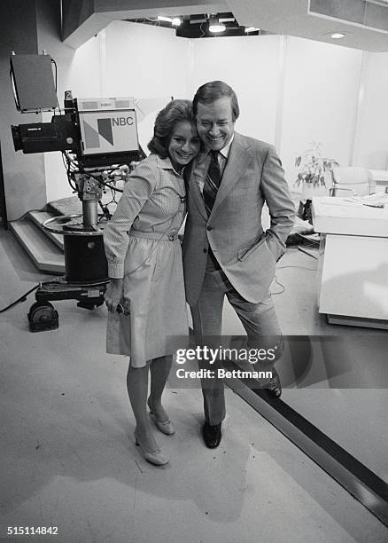 Newscaster barbara Walters receives a good bye hug from Hugh downs, her former co-host on NBC-TV's "Today Show," here June 3 during her last...