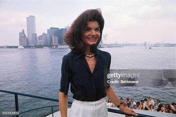 The familiar towers of Manhattan and the not unknown physiognomy of Jacqueline Kennedy Onassis can be made out in the New York Harbor, as she returns...