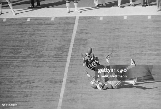 Pittsburgh's Lynn Swann makes a diving catch for 53 yards late in the 2nd quarter and falls over Mark Washington, corner back for the Dallas Cowboys...