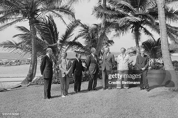 Dorado Beach, Puerto Rico: After hosting an Economic Summit Conference at the Dorado Beach Hotel, President Ford chats with his colleagues outside...