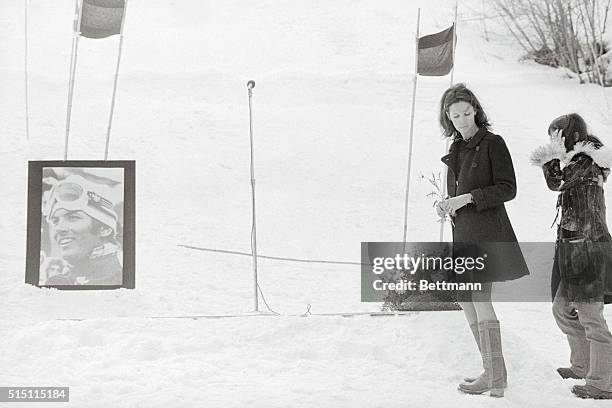 Claudine Longet. Aspen, Colorado: French born actress singer, Claudine Longet takes a single daisy from a lone bouquet of flowers during memorial...