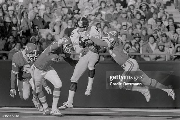 Steelers' wide receiver Lynn Swann catches a pass on the one yard line from quarterback Terry Bradshaw in the 4th quarter setting up another...