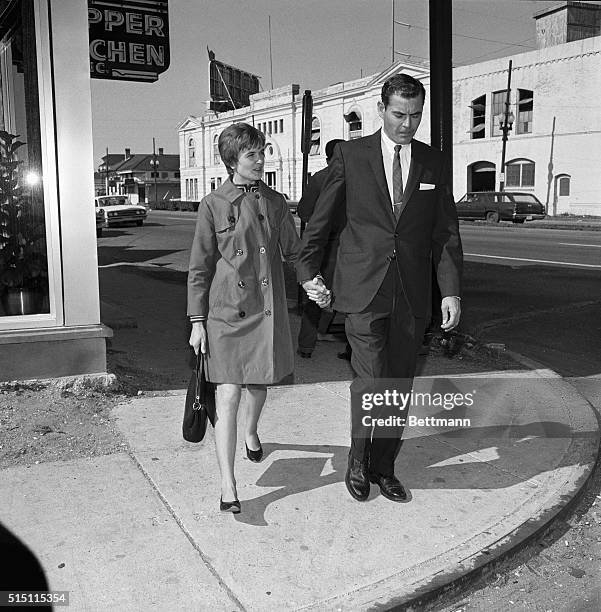 Mrs. Marina Oswald Porter and her husband Kenneth Porter are seen here in New Orleans where she answered a grand jury subpoena in connection with a...