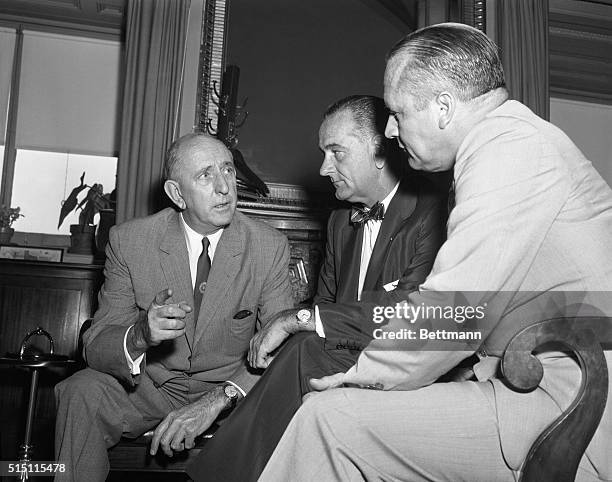 Senator Richard B. Russell, left, number 1 opponent of the Civil Rights Bill is shown in a huddle with Senate Majority Leader Lyndon B. Johnson,...