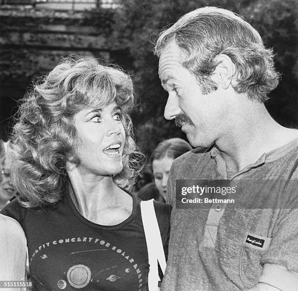 Mike Farrell, who stars in the television series M*A*S*H, chats with Jane Fonda at a party at a posh Hancock Park home recently. The party was a...