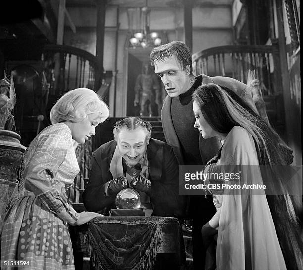 The adult cast of the CBS television situation comedy 'The Munsters' including American actress Pat Priest , actor and political activist Al Lewis ,...