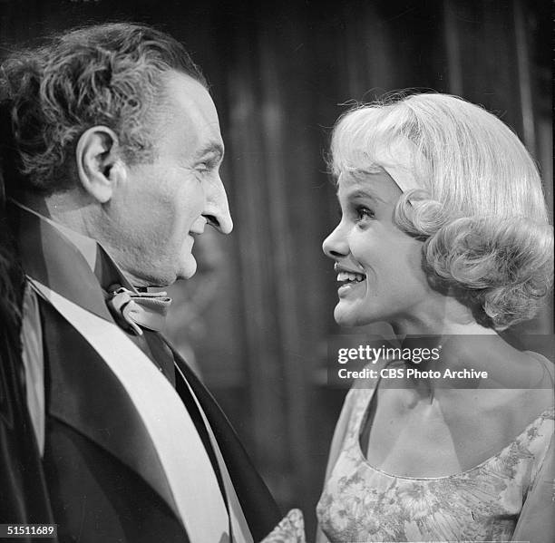 American actor and piolitical activist Al Lewis and actress Beverly Owen in a still from the CBS television situation comedy 'The Munsters' episode...