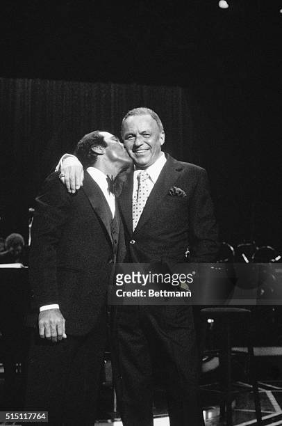 Hosting the United Cerebral Palsy annual telethon. Paul Anka gets a surprise visit during taping from Frank Sinatra, who then sang three songs. Anka,...