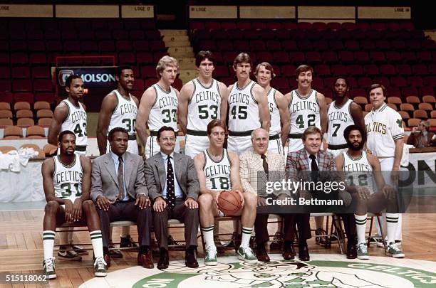 Boston Celtics team picture . Front row: Left to right; Cedric Maxwell; Assistant coach, K.C. Jones; owner of the Celtics, Harry Mangurian; Dave...