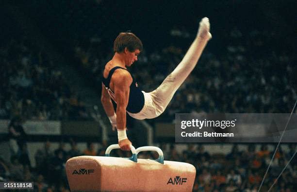 American gymnast Kurt Thomas performs on the pommel horse 12/7 as he brought the U.S.A. Its first medal in modern World Gymnastics Championship...
