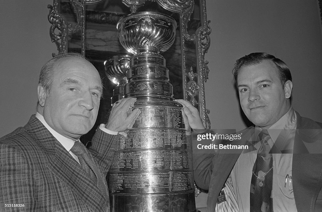 Billy Reay and Scotty Bowman with the Stanley Cup