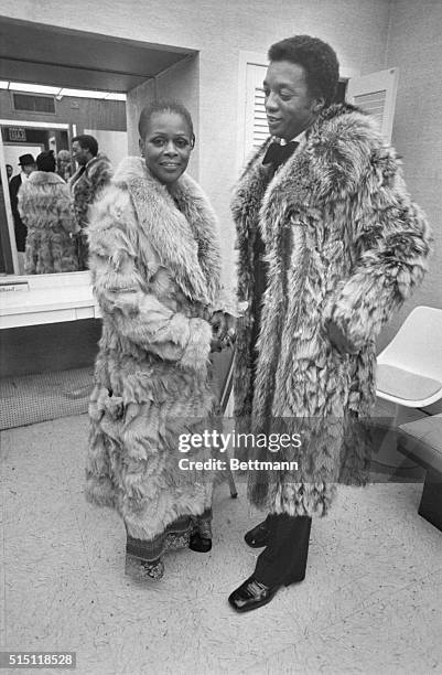 New York, New York- Cicely Tyson and Paul Winfield "match' coats at New York's Carnegie Hall recently during an appearance at a benefit for the...