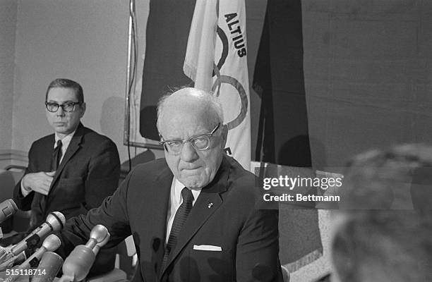 Chicago, Illinois: Avery Brundage, president of the International Olympic Committee, talking at a news conference where he announced that he will...