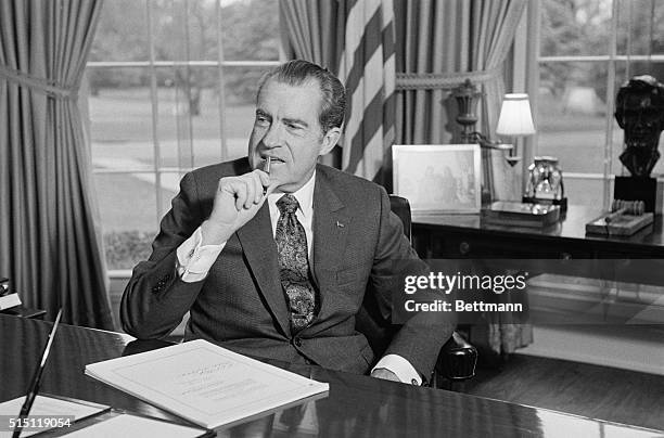 Washington, DC-ORIGINAL CAPTION READS: President Nixon reflects on the activities on the activities of the 92nd congress after signing the fianl bill...