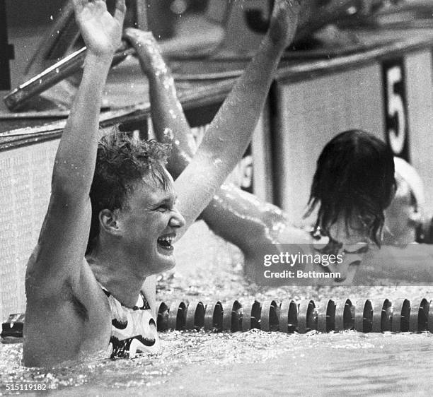 Montreal, Canada- Andrea Pollack of East Germany shows her joy as she waves after winning a gold medal, and setting a new Olympic record of 2:11;41...