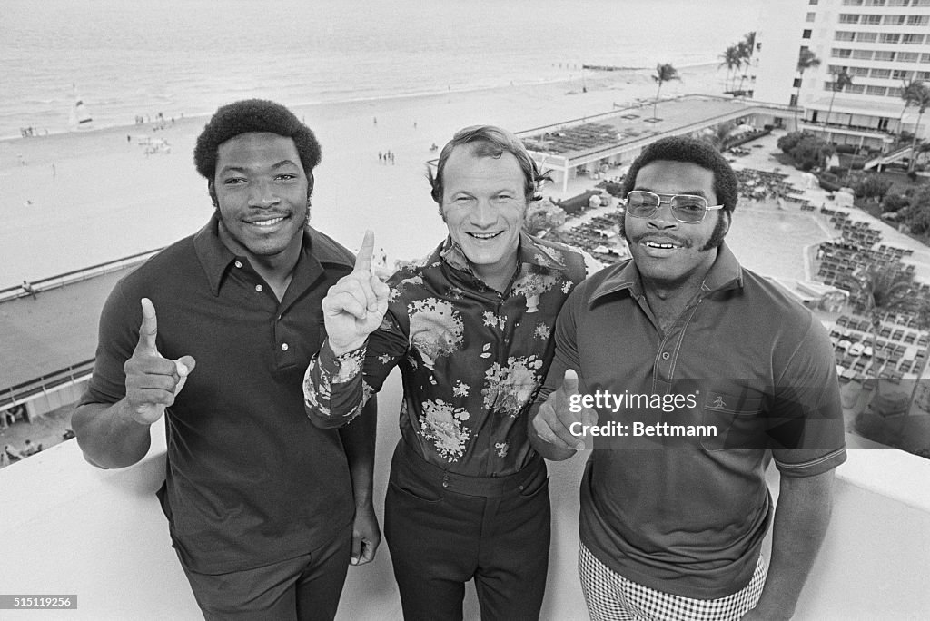 Barry Switzer with Lee Roy and Dewey Selmon