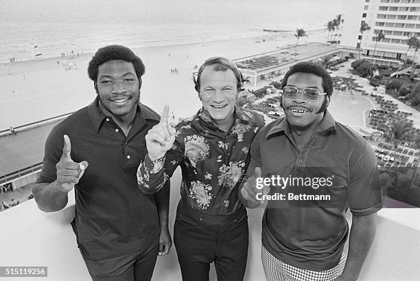 Flashing a victorious smile all and signaling their new status, Oklahoma head coach Barry Switzer and Selmon brothers Lee Roy , named Most Valuable...