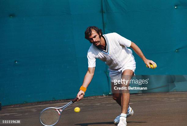 Tokyo, Japan: John Newcombe of Australia is shown during the final match of Men's singles in 1974 Japan Open Tennis Tournament. He beat fellow...