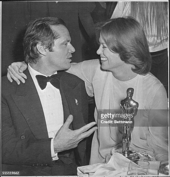 Oscar winners Jack Nicholson and Louise Fletcher celebrate their victories at a party after winning top honors at the Academy Awards. Nicholson won...