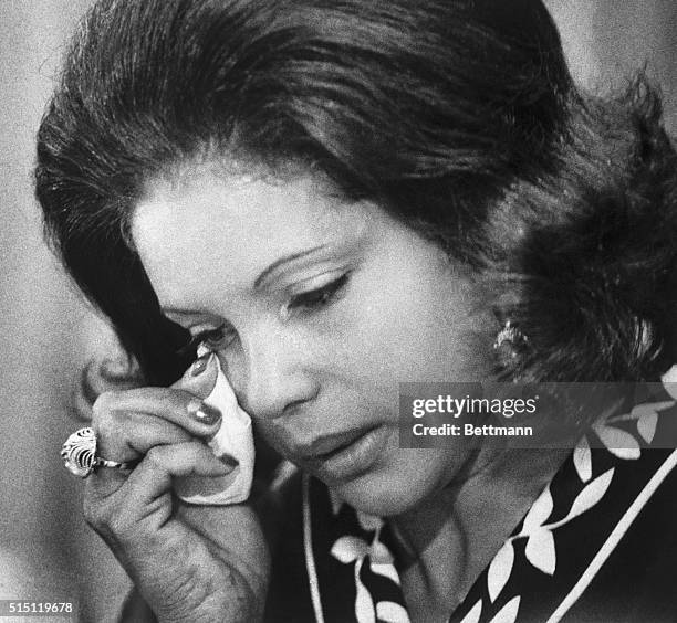 Mrs. Roberto Clemente wipes away a tear during the 27th annual Governors baseball dinner here 3/20. Mrs. Clemente, widow of Pittsburgh Pirates all...