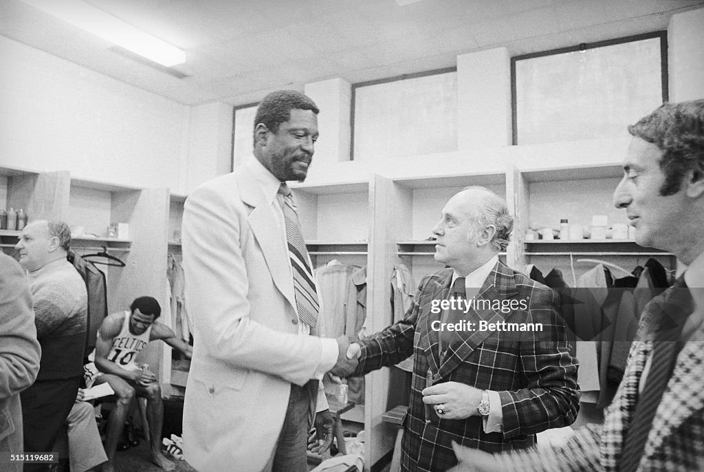 Arnold Auerbach Shaking Hands with Bill Russell