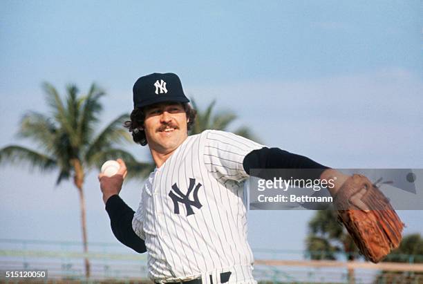 Ft. Lauderdale, Fla.: Yankees' pitcher "Catfish" Hunter shown in first day of Spring training here.
