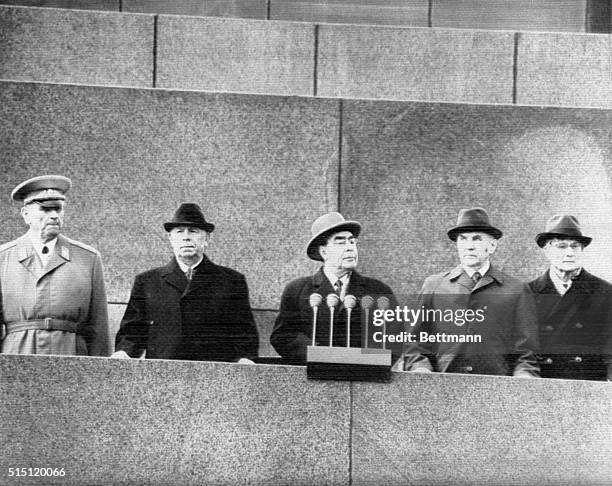 Moscow, Russia- Soviet Leaders watch from rostrum of the Lenin Mausoleum as contingents of May Day Parade pass reviewing stand on Red Square here....