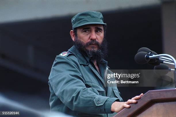 Close up of Cuban Premier Fidel Castro is shown, standing at a podium, and giving a speech.