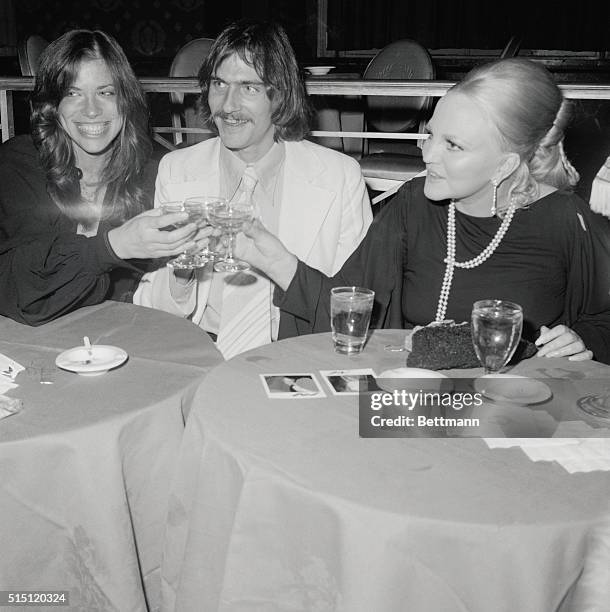 Singer Peggy Lee with rock-stars James Taylor and his wife, Carly Simon following Miss Lee's opening at the Empire Room of the Waldorf-Astoria.