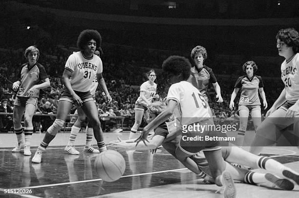Women's college basketball action in Madison Square Garden, Althea Gywn of Queens College looks on a ball out of bounds during game against...