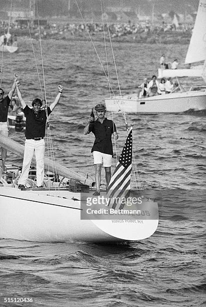 Victorious Ted Turner and the crew of Courageous celebrate their 4-0 win in the America's Cup defense off Newport. Courageous led Australia by 2...