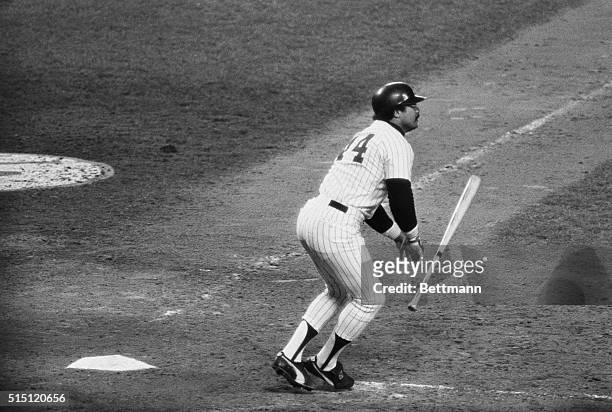 New York: Reggie Jackson drops his bat and watches flight of the ball as he hit his second home run to clobber the Dodgers in the World Series. This...