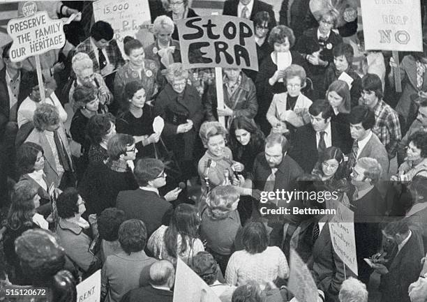 Springfield, Ill: Surrounded by supporters and reporters, STOP ERA leader Phyllis Schlafly of Alton, Ill. State Sen. James Donnewald for his help in...