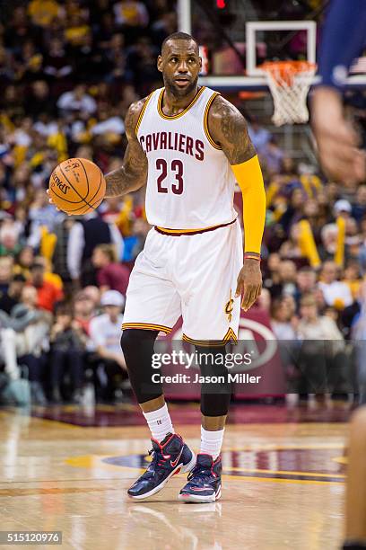 LeBron James of the Cleveland Cavaliers drives down the court during the second half against the Memphis Grizzlies at Quicken Loans Arena on March 7,...
