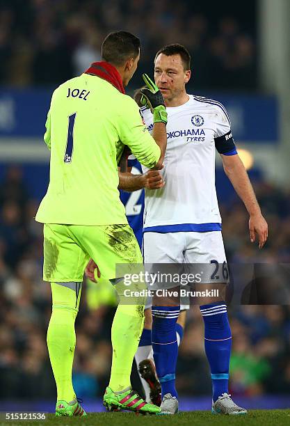 John Terry of Chelsea and Joel Robles of Everton talk after the Emirates FA Cup sixth round match between Everton and Chelsea at Goodison Park on...