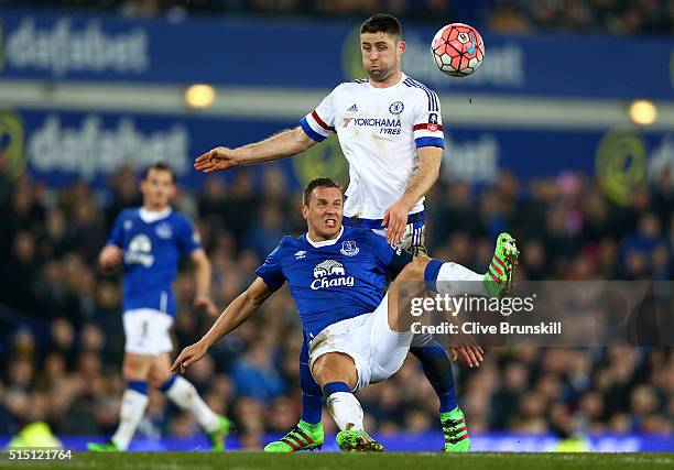 Phil Jagielka of Everton and Gary Cahill of Chelsea compete for the ball during the Emirates FA Cup sixth round match between Everton and Chelsea at...