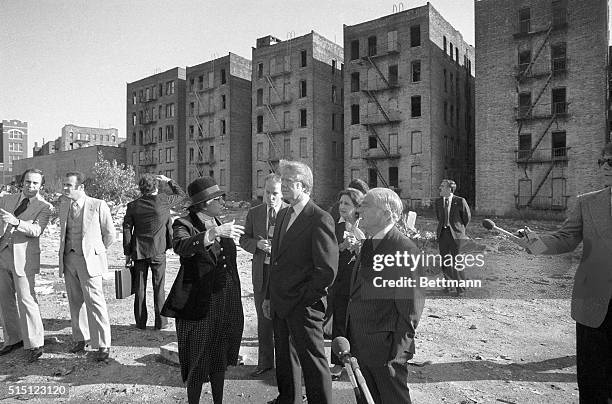 New York, NY- Standing in front of a row of burned out apartment houses in the South Bronx Oct. 5, Housing and Urban Development Secretary Patricia...