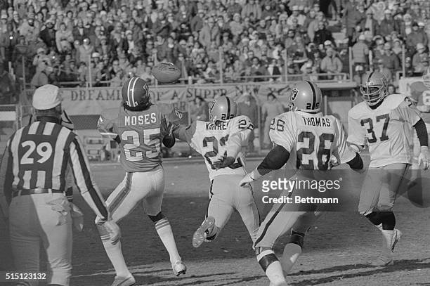 Denver Bronco's Haven Moses looks back for the Oakland Raiders that weren't there, as he takes a Craig Morton pass 74 yards for a touchdown in the...