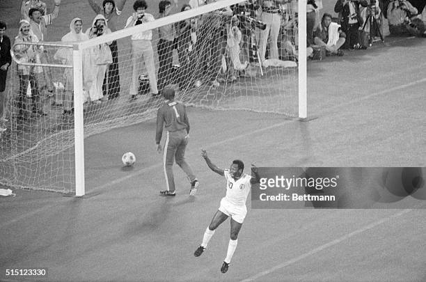 East Rutherford, NJ- Pele of the New York Cosmos leaps for joy after scoring a goal against the Rochester Lancers at East Rutherford. Lancers'...