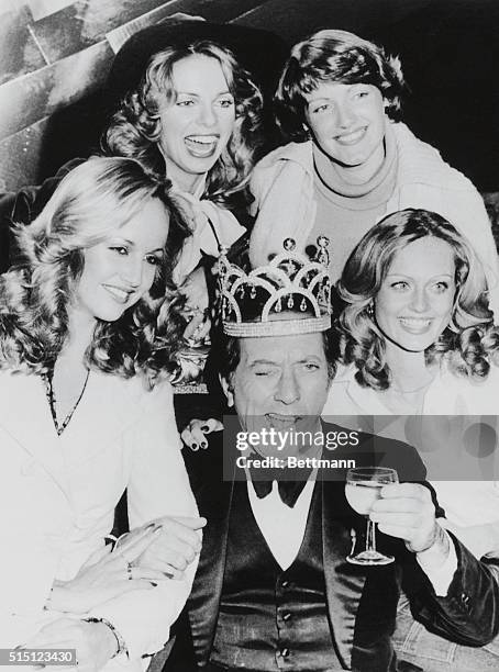 London: Singer Andy Williams who will host the Miss World Contest Nov. 17, clowns around with some of the contestants during a dress rehearsal late...