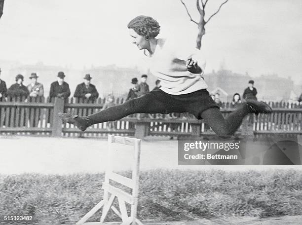 Mary Lines During Olympic Hurdle Jump