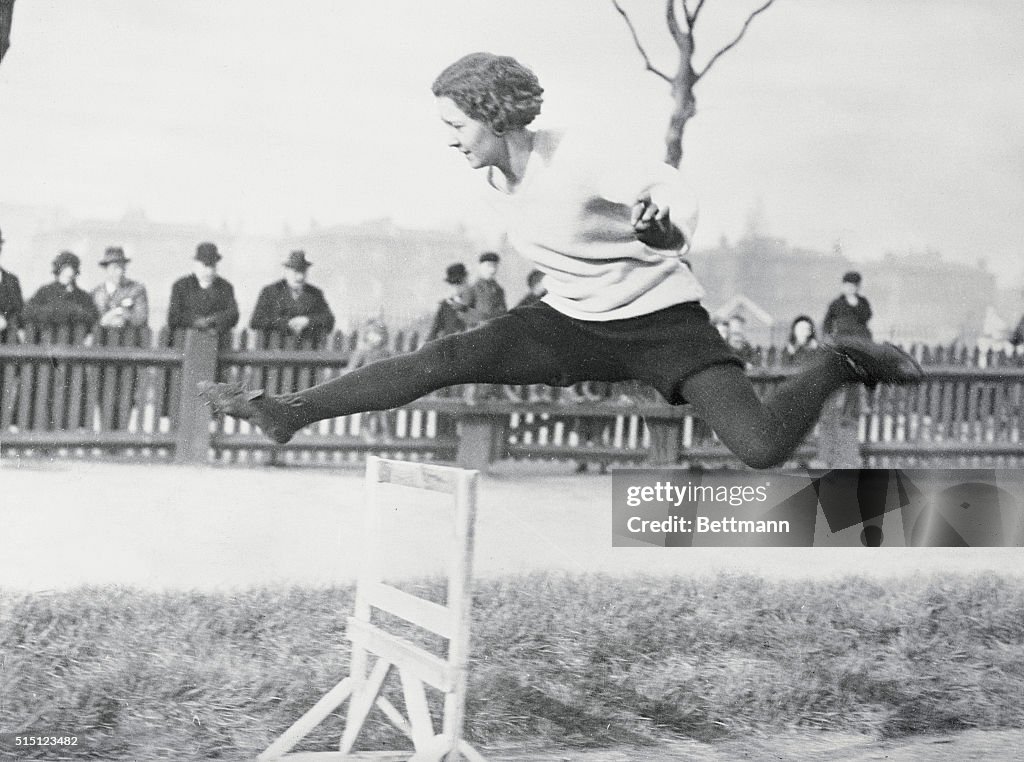 Mary Lines During Olympic Hurdle Jump