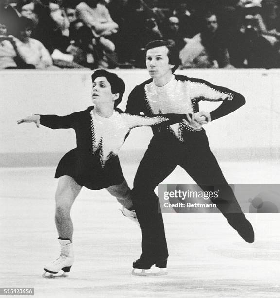 Lake Placid, N.Y.: Irinia Rodnina and Aleksandr Zaitzev, the Soviet duo which won the Olympic title in 1976, took the lead in Olympic pairs short...