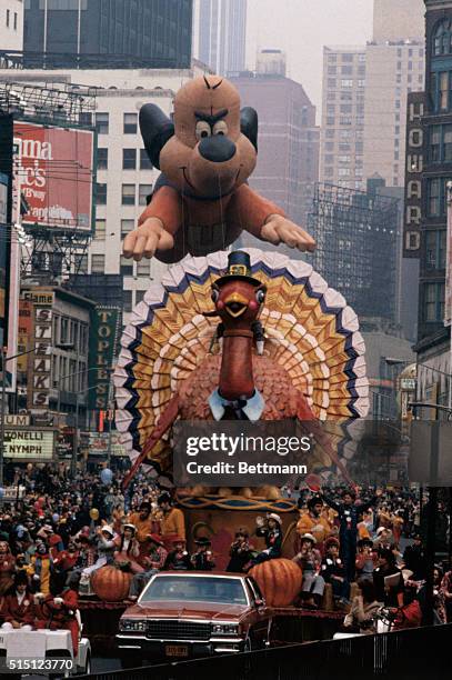 Foot helium balloon of Underdog, a television cartoon favorite for millions of kids, follows a turkey float down Broadway 11/22 in the seven-hour...